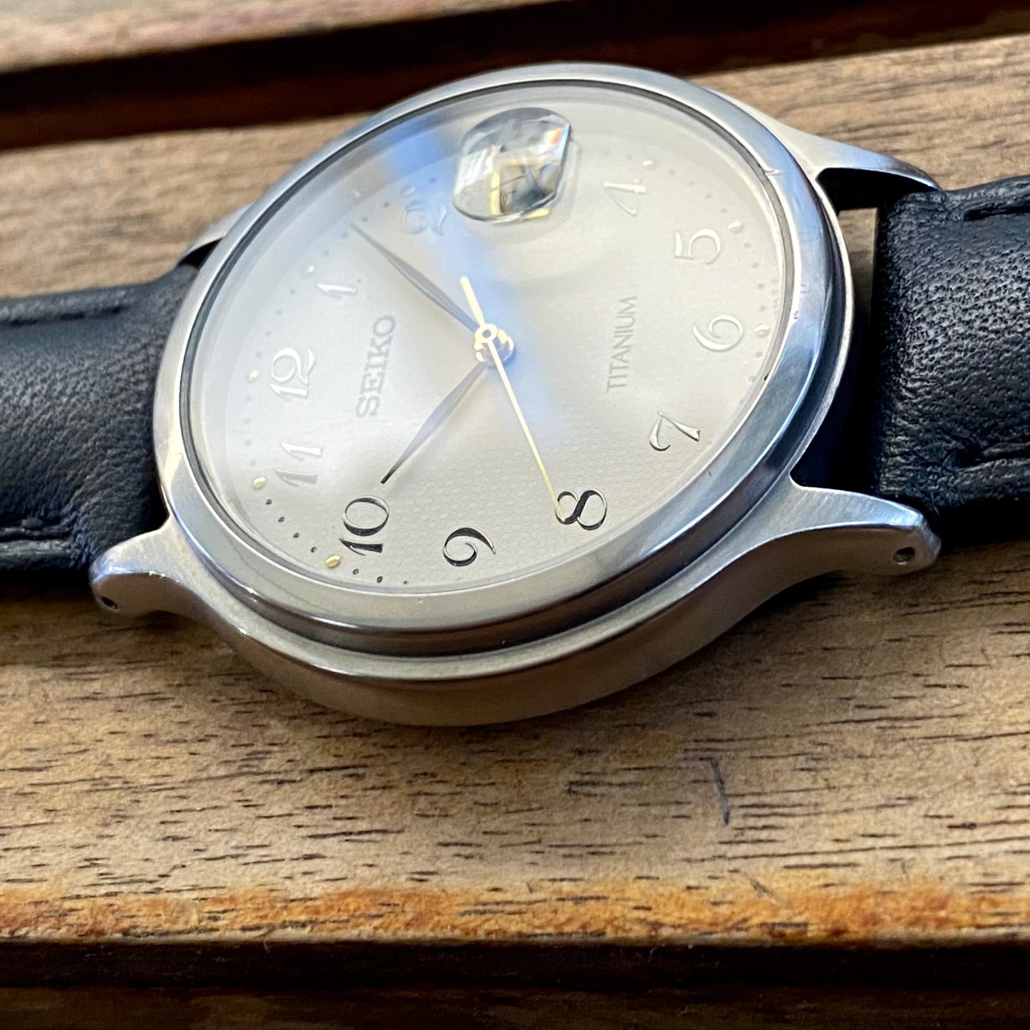 Vintage December 1992 Seiko Titanium Quartz 7N42-8A60 Cream Waffle Dial