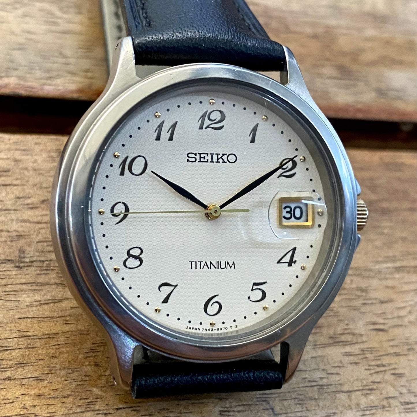 Vintage December 1992 Seiko Titanium Quartz 7N42-8A60 Cream Waffle Dial