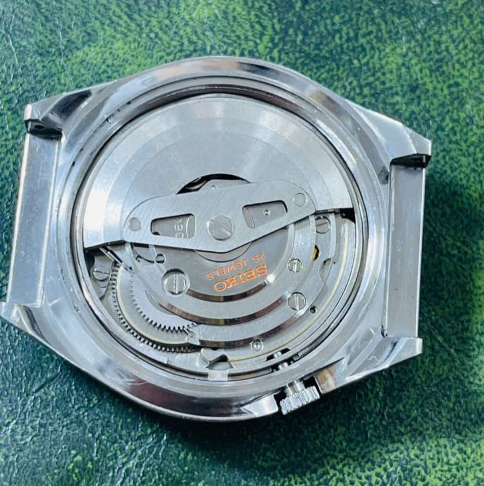 Vintage Seiko 5 Actus 6106-7690 watch movement, detailed view of the mechanical components and craftsmanship.