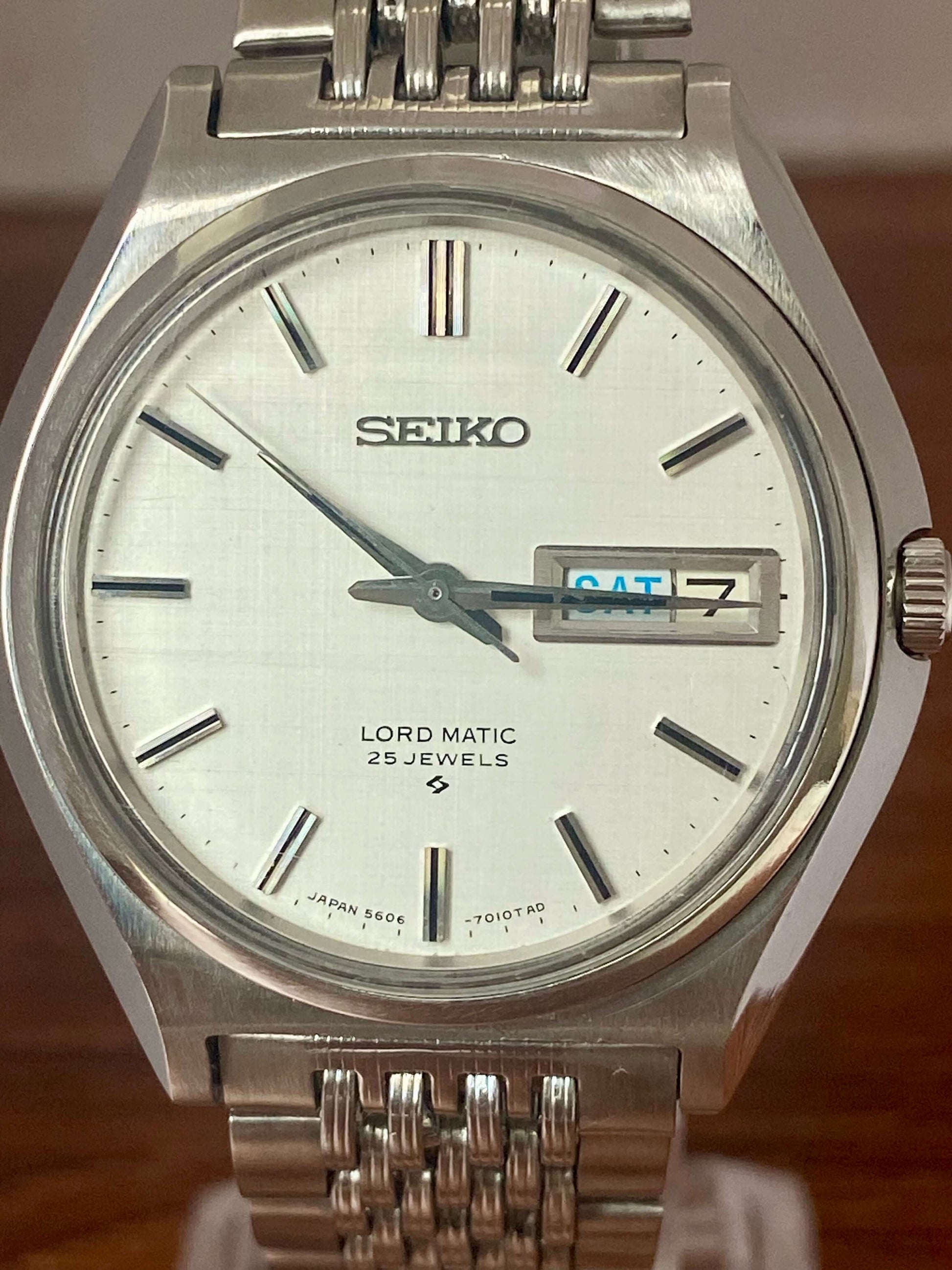 Vintage Seiko Lord Matic 5606-7010 with original white linen dial and automatic movement, May 1968 edition.