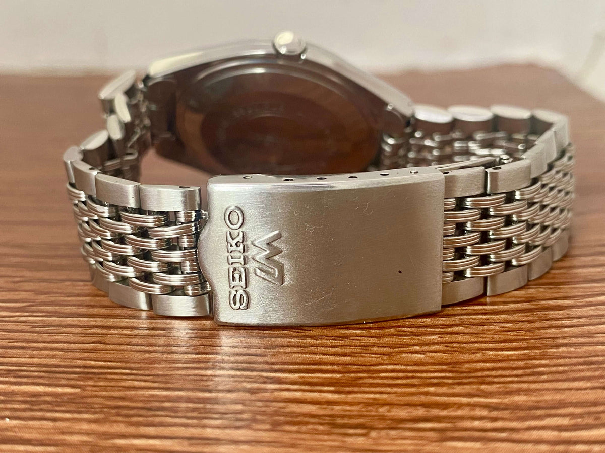 Vintage Seiko Lord Matic 5606-7010 back view showing original bracelet and clasp detail.