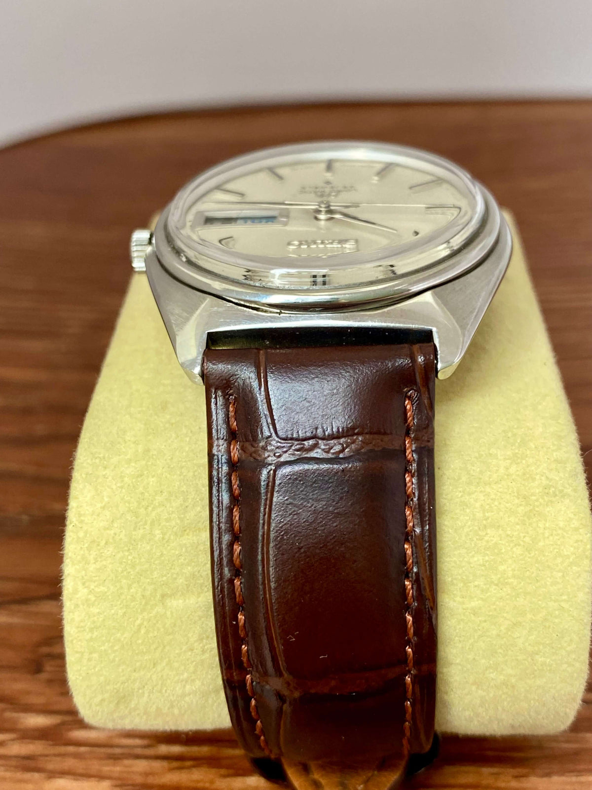 Vintage Seiko Lord Matic 5606-7000 side view showing original dial and brown leather strap.