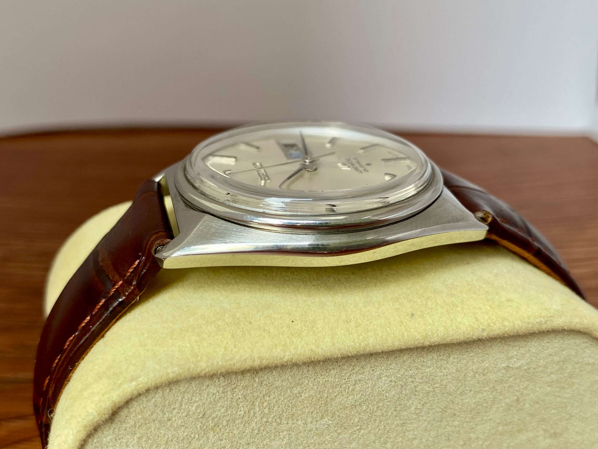 Vintage Seiko Lord Matic 5606-7000 profile view on leather strap, showcasing its original dial and classic design.